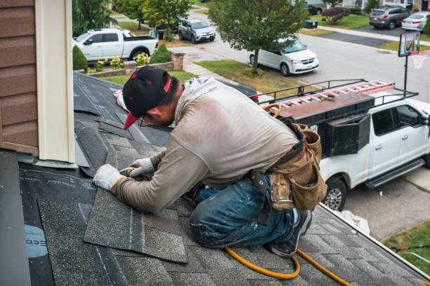 Professional Roofing technician working in Redwood Estates, CA